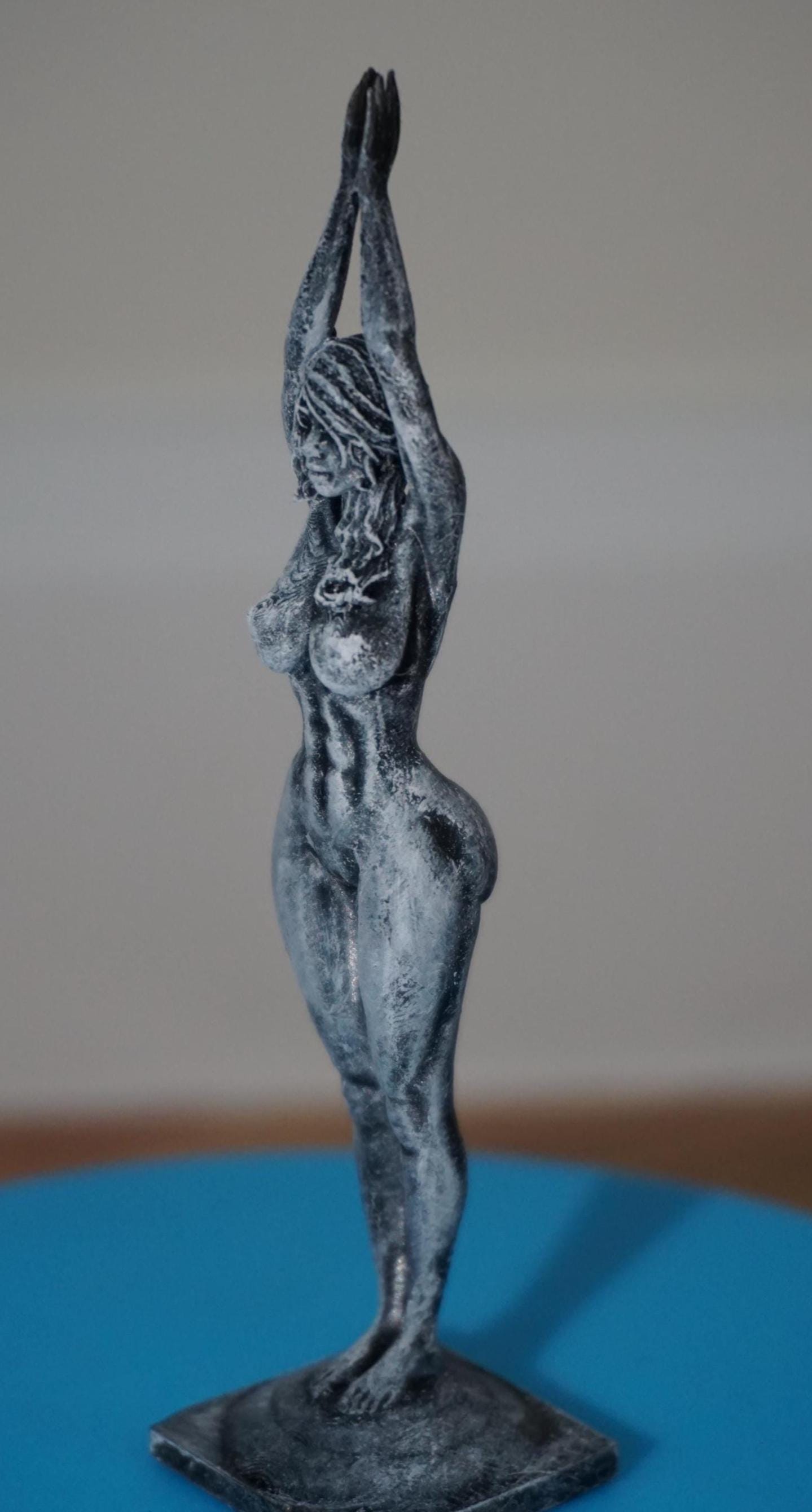 Ascend – Nude Woman in Uplifted Grace Sculpture