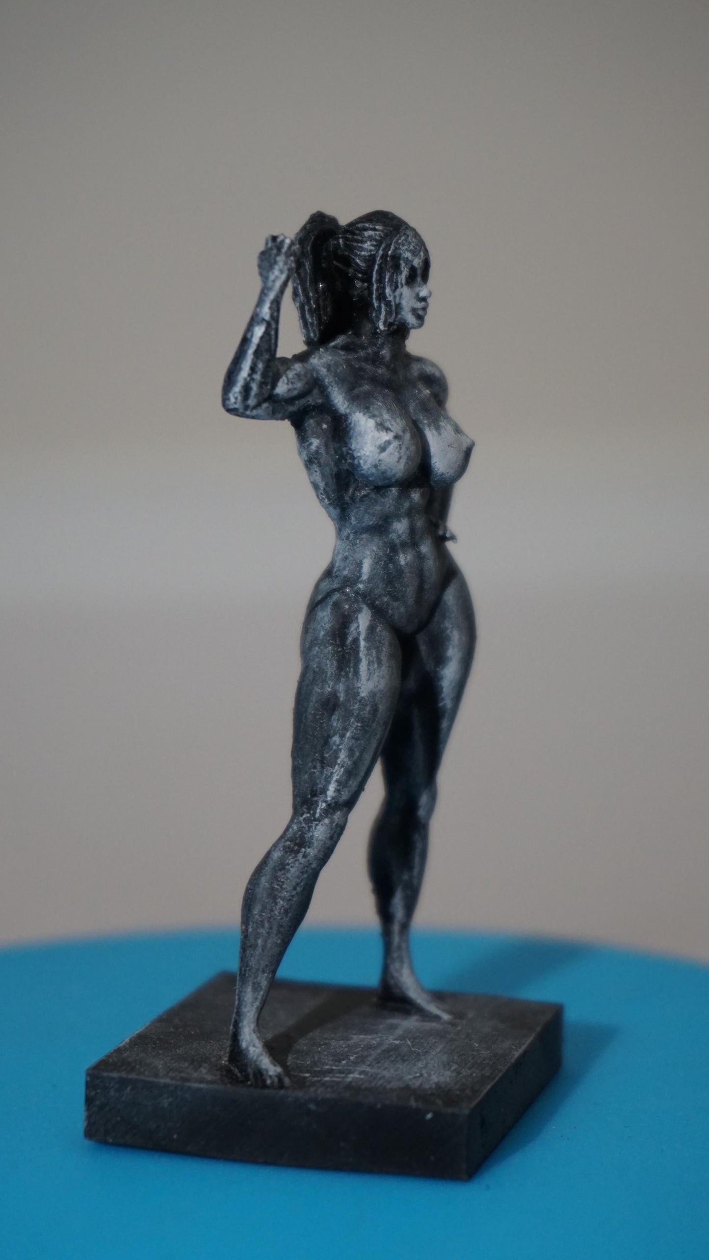 Iron Grace – Female Bodybuilder in Triumph | Sculpture