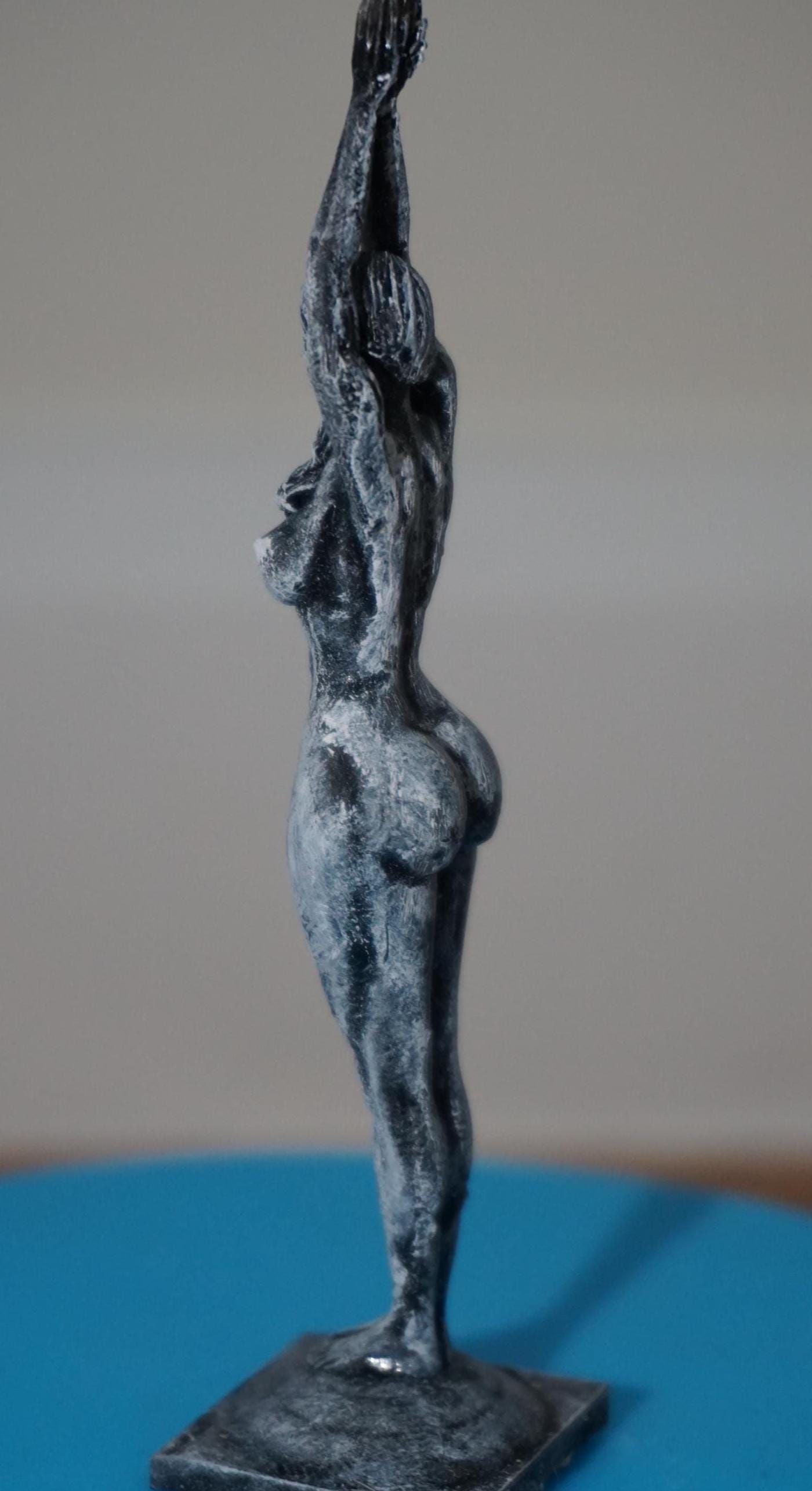 Ascend – Nude Woman in Uplifted Grace Sculpture