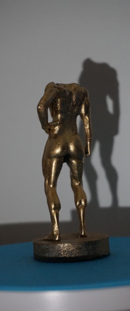 Gilded Strength Statue