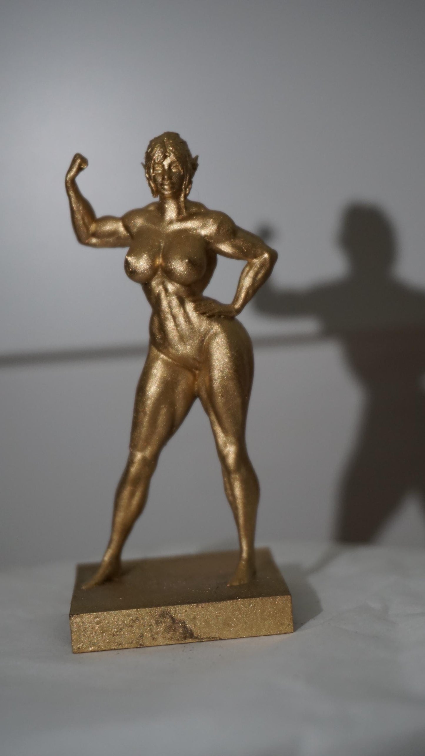 Iron Grace – Female Bodybuilder in Triumph | Sculpture